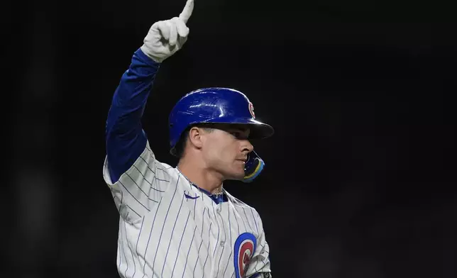 Chicago Cubs' Matt Shaw celebrates after hitting walkoff home run in the 10th inning of a baseball game to defeat the Cleveland Guardians, Thursday, July 3, 2025, in Chicago. (AP Photo/Erin Hooley)
