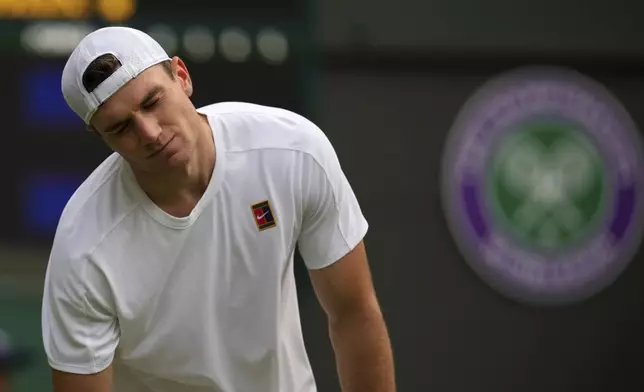 Jack Draper of Britain reacts during his second round men's singles match against Marin Cilic of Croatia at the Wimbledon Tennis Championships in London, Thursday, July 3, 2025.(AP Photo/Kin Cheung)