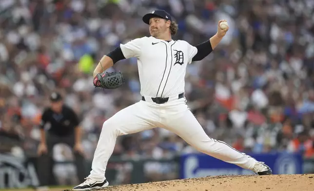 Detroit Tigers pitcher Dietrich Enns throws against the Toronto Blue Jays during the sixth inning of a baseball game Thursday, July 24, 2025, in Detroit. (AP Photo/Paul Sancya)