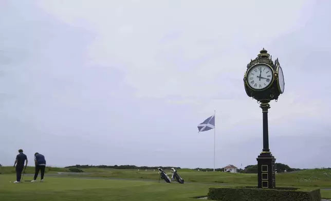 Golfers on the putting green at the Trump Turnberry golf course in Turnberry, Scotland, Wednesday, July 23, 2025, President Trump is expected to visit Scotland in the next few day. (AP Photo/Alastair Grant)