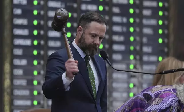 Texas Speaker of the House Dustin Burrows strikes the gavel as the House calls a Special Session, Monday, July 21, 2025, in Austin. (AP Photo/Eric Gay)