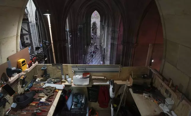 A makeshift work room is seen during the installation of a new organ at Prague's St. Vitus Cathedral that is coming to its final stages in Prague, Czech Republic, Tuesday, July 22, 2025. (AP Photo/Petr David Josek)