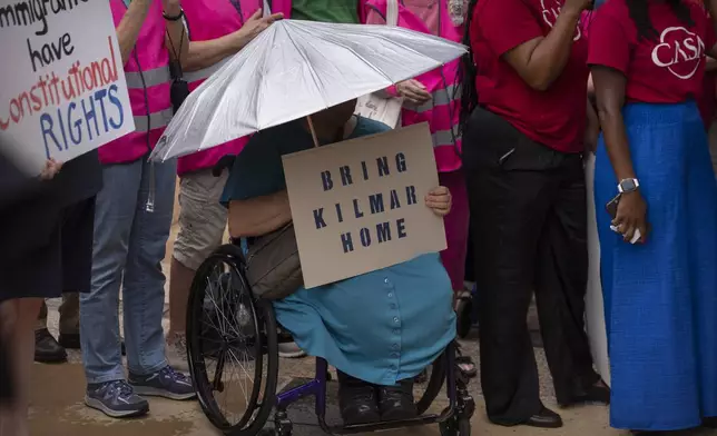 Supporters of Kilmar Abrego Garcia rally outside of the U.S. District Court in Greenbelt, Md., where a hearing was scheduled to be held on returning him to Maryland, Monday, July 7, 2025. (AP Photo/Mark Schiefelbein)