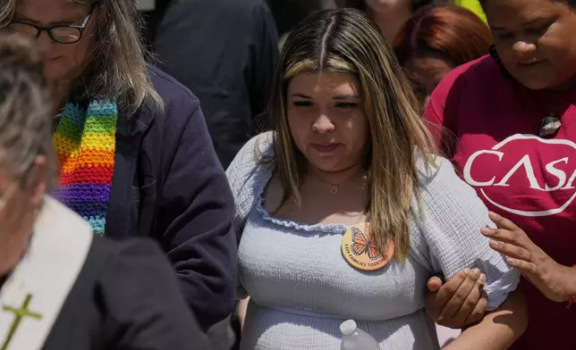 Jennifer Vasquez Sura, center, wife of Kilmar Abrego Garcia arrives at the federal courthouse Wednesday, July 16, 2025, in Nashville, Tenn. (AP Photo/George Walker IV)