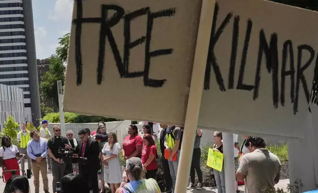 A rally sign is seen during a news conference outside the federal courthouse before a hearing for Kilmar Abrego Garcia, Wednesday, July 16, 2025, in Nashville, Tenn. (AP Photo/George Walker IV)