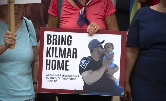 Supporters of Kilmar Abrego Garcia rally outside of the U.S. District Court in Greenbelt, Md., where a hearing was scheduled to be held on returning him to Maryland, Monday, July 7, 2025. (AP Photo/Mark Schiefelbein)