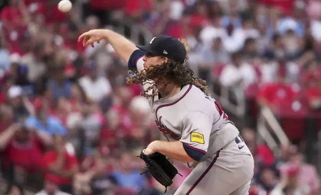 Atlanta Braves starting pitcher Grant Holmes throws during the first inning of a baseball game against the St. Louis Cardinals Friday, July 11, 2025, in St. Louis. (AP Photo/Jeff Roberson)