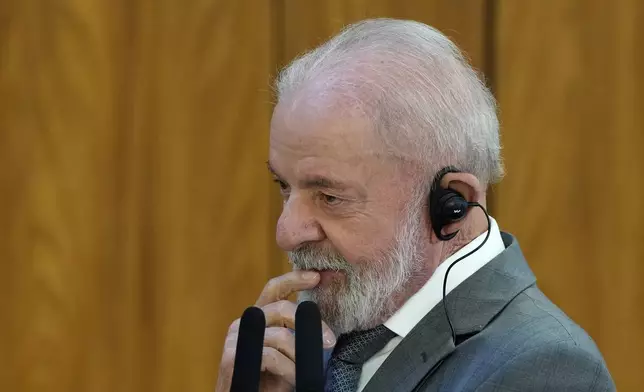 Brazil's President Luiz Inacio Lula da Silva attends an event at the Planalto presidential palace in Brasilia, Brazil, Wednesday, July 9, 2025. (AP Photo/Eraldo Peres)