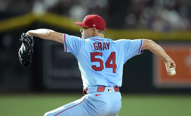 St. Louis Cardinals starting pitcher Sonny Gray throws against the Arizona Diamondbacks during the third inning of a baseball game Saturday, July 19, 2025, in Phoenix. (AP Photo/Ross D. Franklin)