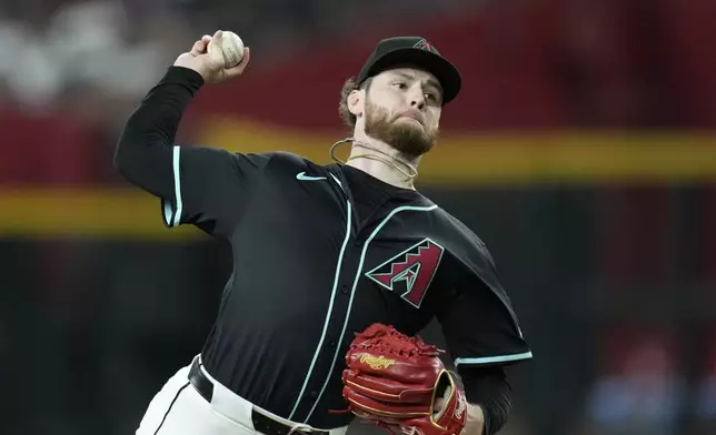 Arizona Diamondbacks starting pitcher Ryne Nelson throws against the St. Louis Cardinals during the first inning of a baseball game Saturday, July 19, 2025, in Phoenix. (AP Photo/Ross D. Franklin)