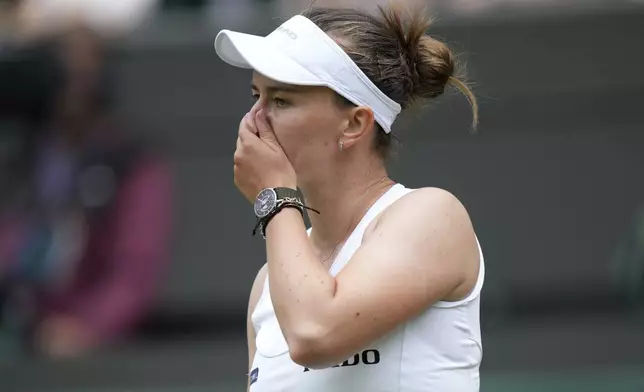 Barbora Krejcikova of Czech Republic reacts during her women's singles third round match against Emma Navarro of the U.S. at the Wimbledon Tennis Championships in London, Saturday, July 5, 2025.(AP Photo/Alastair Grant)