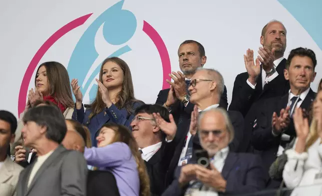 (top row from left to right) Princess Sofia and Princess Leonor of Spain UEFA president Aleksander Ceferin and Britain's Prince William attend the Women's Euro 2025 final soccer match between England and Spain at St. Jakob-Park in Basel, Switzerland, Sunday, July 27, 2025. (AP Photo/Martin Meissner)