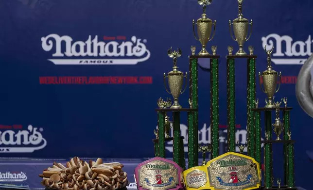 Hot dogs are prepared ahead of the 2025 Nathan's Famous Fourth of July hot dog eating contest in the Coney Island section of the Brooklyn borough of New York, Thursday, July 4, 2025. (AP Photo/Yuki Iwamura)