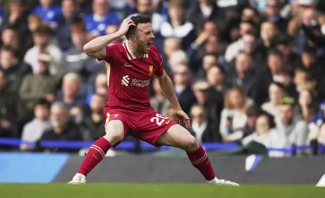 FILE - Liverpool's Diogo Jota reacts during the English Premier League soccer match between Chelsea and Liverpool at Stamford Bridge stadium in London, Sunday, May 4, 2025. (AP Photo/Kin Cheung, File)