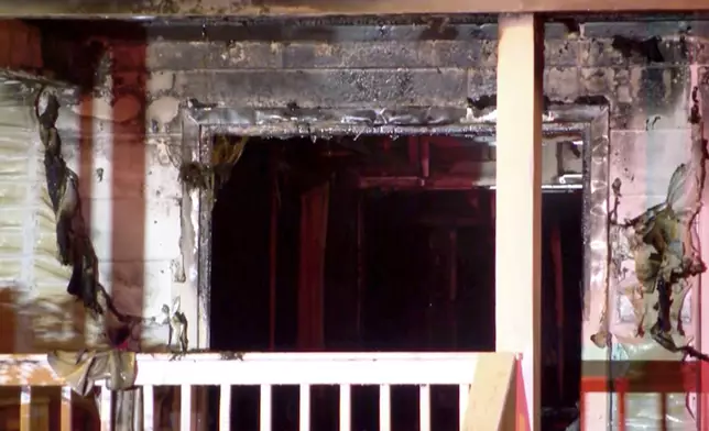 This image taken from video provided by WLNE-TV shows damage from a fire at an assisted living facility in Fall River, Mass., Sunday, July 13, 2025. (WLNE-TV via AP)
