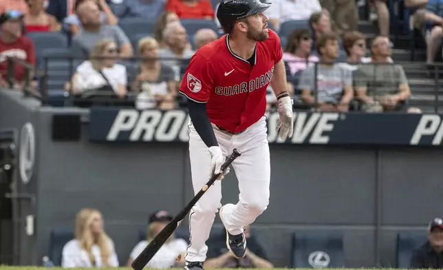 Cleveland Guardians' David Fry watches his two-run home run off Colorado Rockies starting pitcher Kyle Freeland during the first inning of a baseball game, Wednesday, July 30, 2025, in Cleveland. (AP Photo/Phil Long)