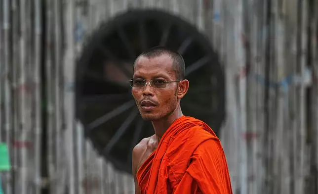 Cambodian Buddhist chief monk, Tho Thoross stands during an interview with The Associated Press at the Wat Prasat Samrong Pagoda in Oddar Meanchey province, Cambodia, Saturday, July 26, 2025, during fighting between Thailand and Cambodia. (AP Photo/Heng Sinith)