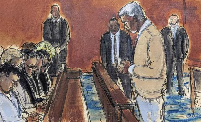In this courtroom sketch, Sean "Diddy" Combs, rights, leads his family in a prayer before the verdict was read, convicting him of prostitution-related offenses but acquitting him of sex trafficking and racketeering charges, Wednesday, July 2, 2025, in Manhattan federal court in New York. (Elizabeth Williams via AP)