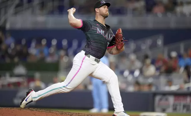 Miami Marlins closing pitcher Anthony Bender (37) pitches in the ninth inning of a baseball game, Saturday, July 19, 2025, in Miami. (AP Photo/Rebecca Blackwell)