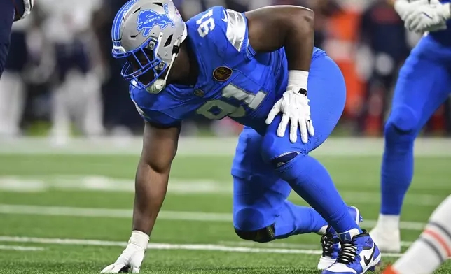 FILE - Detroit Lions defensive end Levi Onwuzurike waits for the snap of the ball during the first half of an NFL football game against the Chicago Bears in Detroit, Nov. 28, 2024. (AP Photo/David Dermer, file)