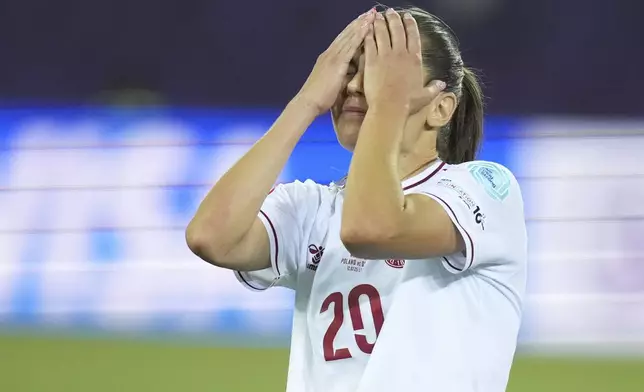 Denmark's Signe Bruun reacts after missing a scoring chance during the Women's Euro 2025, group C, soccer match between Poland and Denmark at Allmend Stadion Luzern in Lucerne, Switzerland, Saturday, July 12, 2025. (AP Photo/Alessandra Tarantino)