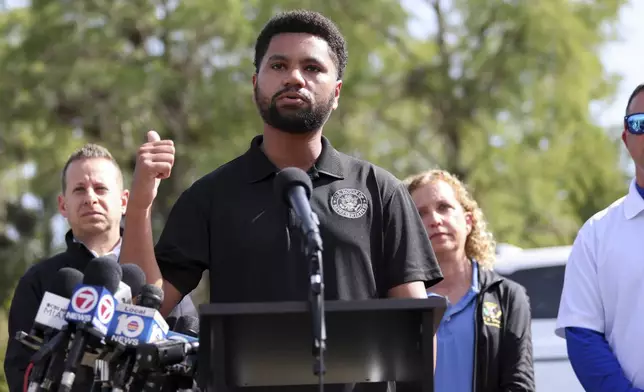 Rep. Maxwell Frost speaks outside the migrant detention facility dubbed "Alligator Alcatraz" during a news conference ahead of a tour of the Dade-Collier Training and Transition Facility, Saturday, July 12, 2025, in Ochopee, Fla. (AP Photo/Alexandra Rodriguez)