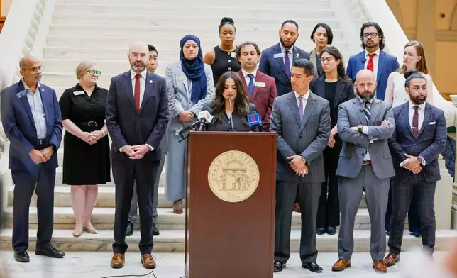 Spanish-language journalist Mario Guevara's daughter Katherine Guevara speaks during a press conference at the Georgia State Capitol in Atlanta, on Tuesday, July 22, 2025. (Miguel Martinez/Atlanta Journal-Constitution via AP)
