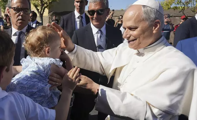 Pope Leo XIV arrives at the papal summer residence in Castel Gandolfo south of Rome for a six-week vacation, Sunday. (AP Photo/Andrew Medichini)