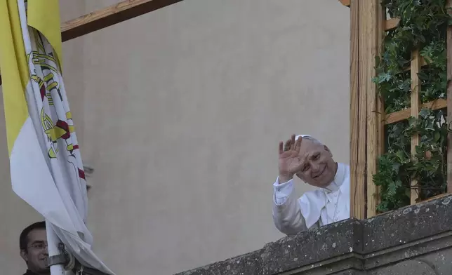 Pope Leo XIV arrives at the papal summer residence in Castel Gandolfo south of Rome for a six-week vacation, Sunday. (AP Photo/Andrew Medichini)