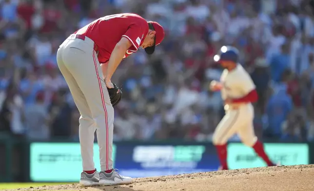 Cincinnati Reds pitcher Nick Lodolo reacts after giving up a two-run home run to Philadelphia Phillies' Alec Bohm during the sixth inning of a baseball game, Saturday, July 5, 2025, in Philadelphia. (AP Photo/Derik Hamilton)