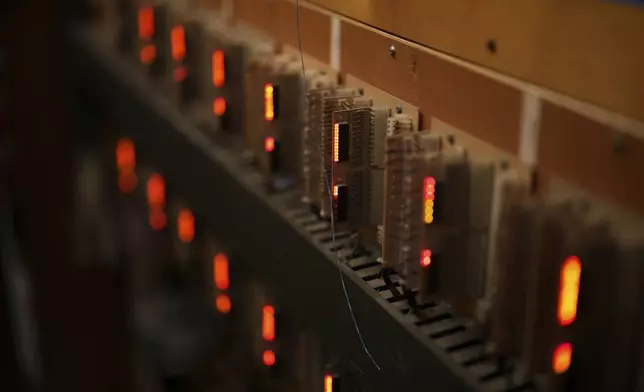 Electronic modules light up during a performance at the storied Wanamaker Building, July 24, 2025, in Philadelphia. (AP Photo/Matt Slocum)