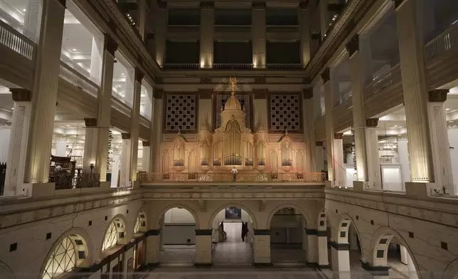 Anthony Roth Costanzo, of Opera Philadelphia, right, performs with Peter Richard Conte, Wanamaker grand court organist, at the storied Wanamaker Building, July 24, 2025, in Philadelphia. (AP Photo/Matt Slocum)