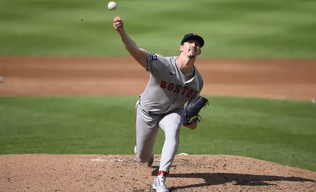 Boston Red Sox starting pitcher Walker Buehler (0) throws during the second inning of a baseball game against the Washington Nationals, Saturday, July 5, 2025, in Washington. (AP Photo/Nick Wass)