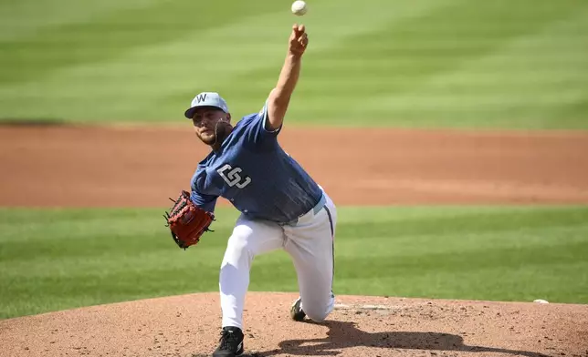 Washington Nationals starting pitcher Mitchell Parker throws during the second inning of a baseball game against the Boston Red Sox, Saturday, July 5, 2025, in Washington. (AP Photo/Nick Wass)