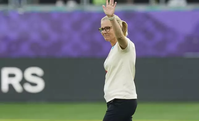 England head coach Sarina Wiegman waves prior the Women's Euro 2025, group D, soccer match between England and Wales at Arena St. Gallen in St. Gallen, Switzerland, Sunday, July 13, 2025. (AP Photo/Martin Meissner)