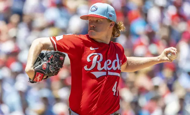 Cincinnati Reds starting pitcher Andrew Abbott throws in the first inning of a baseball game against the Philadelphia Phillies, Friday, July 4, 2025, in Philadelphia. (AP Photo/Laurence Kesterson)