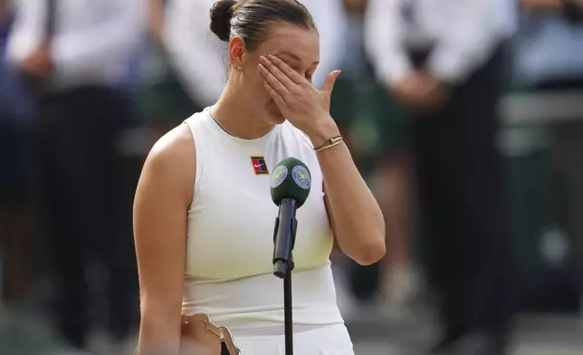 Amanda Anisimova of the U.S. reacts after losing the women's singles final match against Iga Swiatek of Poland at the Wimbledon Tennis Championships in London, Saturday, July 12, 2025.(AP Photo/Kirsty Wigglesworth)