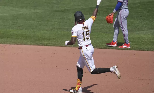 Pittsburgh Pirates' Oneil Cruz (15) rounds the bases after hitting a two-run home run off New York Mets pitcher Dedniel Núñez during the seventh inning of a baseball game in Pittsburgh, Sunday, June 29, 2025. (AP Photo/Gene J. Puskar)