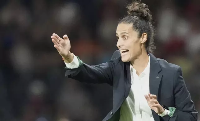 Spain head coach Montserrat Tome gestures during the Euro 2025, group B, soccer match between Spain and Portugal at Stadion Wankdorf in Bern, Switzerland, Thursday, July 3, 2025. (AP Photo/Martin Meissner)