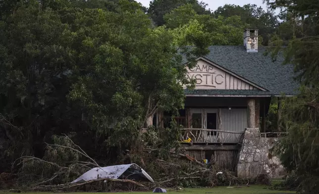FILE - Debris covers the area of Camp Mystic in Hunt, Texas, Monday, July 7, 2025, after a flash flood swept through the area. (AP Photo/Eli Hartman, File)