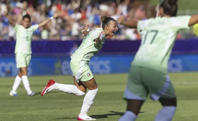 Italy's Arianna Caruso celebrates scoring during the Euro 2025, group B, soccer match between Belgium and Italy at Stade de Tourbillon in Sion, Switzerland, Thursday, July 3, 2025. (Cyril Zingaro/Keystone via AP)