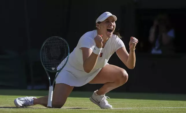 Amanda Anisimova of the U.S. celebrates winning the women's singles quarter finals match against Anastasia Pavlyuchenkova of Russia at the Wimbledon Tennis Championships in London, Tuesday, July 8, 2025.(AP Photo/Kin Cheung)
