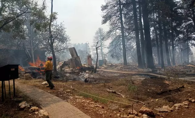 This photo provided by National Park Service shows the charred remains of a building at the North Rim of Grand Canyon National Park, in northern Arizona, on Sunday, July 13, 2025. (National Park Service via AP)