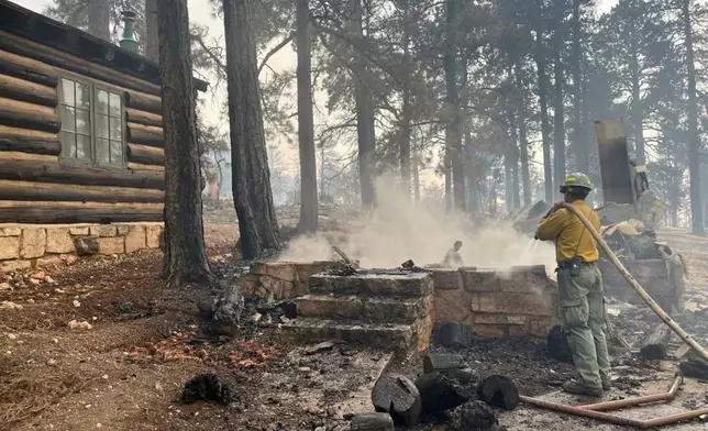 This photo provided by National Park Service shows the charred remains of a building at the North Rim of Grand Canyon National Park, in northern Arizona, on Sunday, July 13, 2025. (National Park Service via AP)