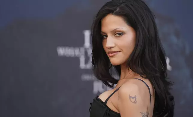 Gabbriette Bechtel, a cast member in "I Know What You Did Last Summer," poses at the premiere of the film at The United Theater on Broadway, Monday, July 14, 2025, in Los Angeles (AP Photo/Chris Pizzello)