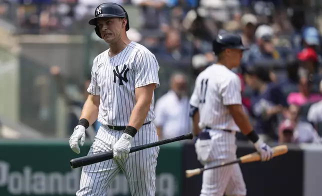 New York Yankees' Ben Rice (22) reacts after striking out during the fourth inning of a baseball game against the Philadelphia Phillies, Saturday, July 26, 2025, in New York. (AP Photo/Yuki Iwamura)