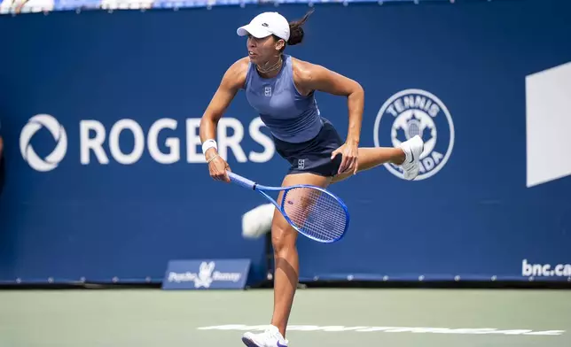 Madison Keys, of USA, serves the ball during second round tennis action against Laura Siegemund, of Germany, at the National Bank Open tennis tournament in Montreal on Wednesday, July 30, 2025. (Christopher Katsarov/The Canadian Press via AP)