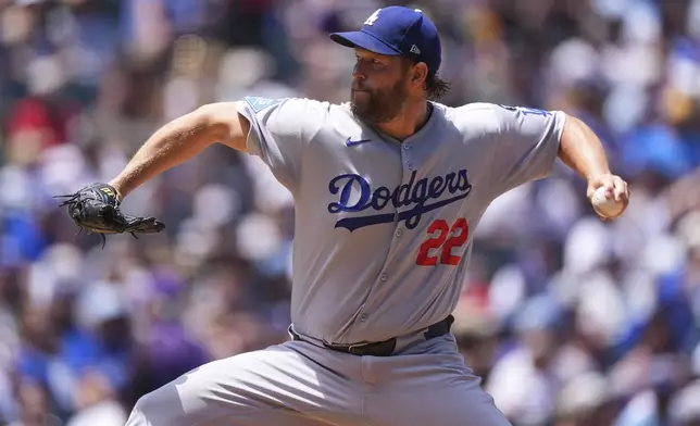 Los Angeles Dodgers starting pitcher Clayton Kershaw works against the Colorado Rockies in the first inning of a baseball game Thursday, June 26, 2025, in Denver. (AP Photo/David Zalubowski)