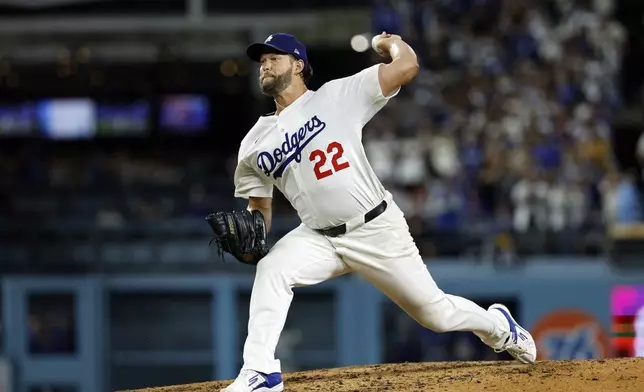 Los Angeles Dodgers pitcher Clayton Kershaw throws against Chicago White Sox's Vinny Capra during the sixth inning to strike him out for his 3,000th career strikeout Wednesday, July 2, 2025, in Los Angeles. (AP Photo/Kevork Djansezian)
