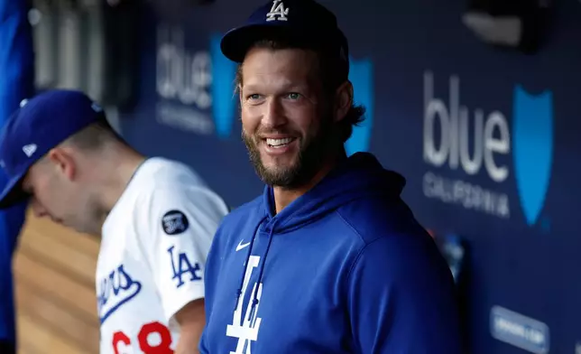 Los Angeles Dodgers pitcher Clayton Kershaw in the dugout before a baseball game against Chicago White Sox Tuesday, July 1, 2025, in Los Angeles. (AP Photo/Kevork Djansezian)
